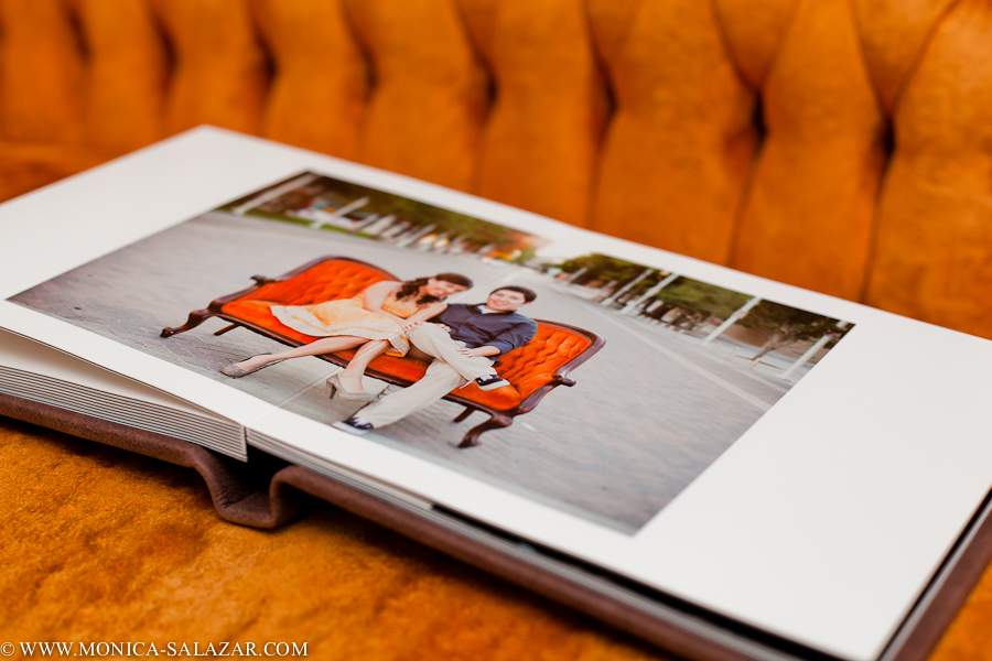 Sample of 8x8 wedding album with a brown leather cover and metal cameo.